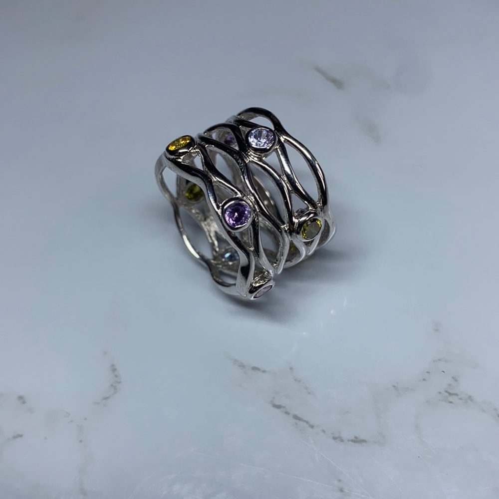 Silver tone ring with pastel colored stones